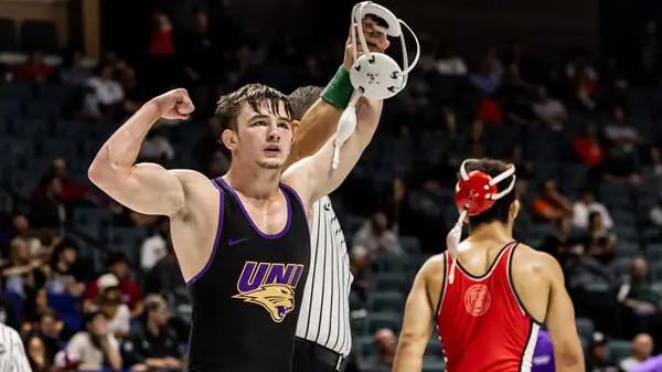 wrestler with arms in the air